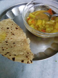 With a Roti (chapati)